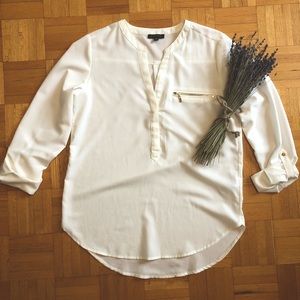 White long sleeve blouse with gold detailing